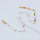 Pulseira Pérolas Delicadas em Aço Inoxidávelvel